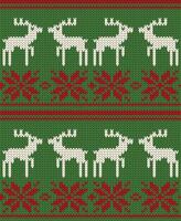 Christmas knitted pattern with reindeer and flowers vector