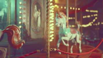 Empty amusement park at night with illuminated carousel and vibrant lights video