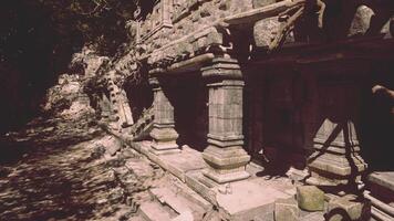 Exploring the ancient Khmer temple ruins in Cambodia surrounded by lush trees video