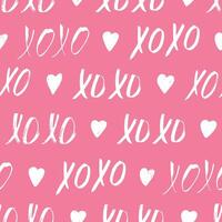 Seamless pattern with XOXO phrase and hearts on pink. Romantic theme. Valentines Day background vector
