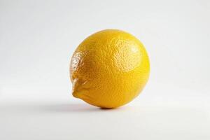 A lemon is shown on a white background photo