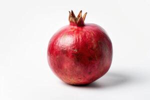 A pomegranate is shown on a white background photo