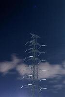 high voltage post.High voltage post.High-voltage tower sky background. photo