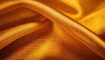 A close up of a golden silk fabric photo