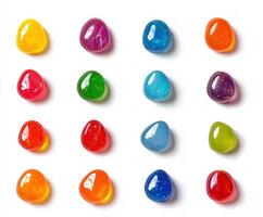 Colorful variety of gel candy arranged in a grid on a white background photo