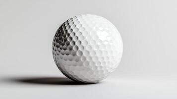 Golf ball resting on a smooth surface with soft shadows highlighting its textured dimples photo