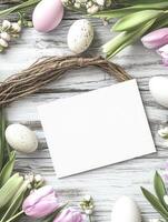 Rustic Easter card mock up with tulips and speckled eggs on white wooden background photo