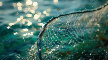 A fisherman adjusts his net on the edge of a tranquil ocean, sparkling reflections dancing on the water's surface as the sun shines brightly above. photo