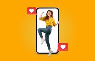 A young woman enthusiastically interacts with a smartphone displaying heart emojis, symbolizing connection and affection. This vibrant scene emphasizes modern dating and communication. photo