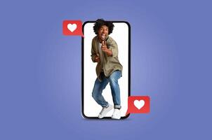 A happy person interacts with their smartphone, showcasing excitement while sending messages related to love. This modern approach to dating highlights connection through applications. photo