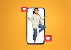 A person joyfully interacts with a smartphone, embodying the excitement of social media communication about love and connections in the digital age. The bright background adds to the uplifting vibe. photo