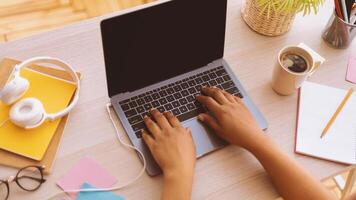 Technology, Communication, Distance Education And Remote Work Concept. Above top view of unrecognizable black woman typing on laptop keyboard, computer with blank empty screen for mockup photo