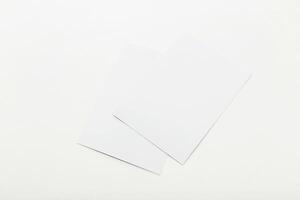 Blank paper sheets on a neutral background ready for art creation or note-taking photo