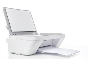 Modern white printer scanning documents with an open lid and paper ready for output photo