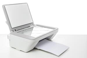 Office printer with scanning function sitting on a desk ready for use during the day photo
