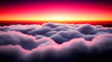A breathtaking sunset viewed from above the clouds, showcasing vibrant colors and serene atmosphere photo