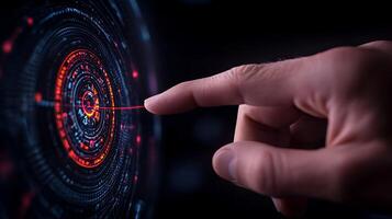 A close-up of a human hand reaching towards a glowing digital interface with vibrant patterns photo