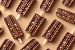 Chocolate ice cream popsicles with nuts forming a pattern on beige background photo