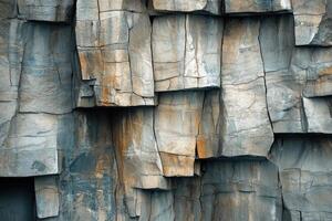 Close up of basalt columns creating a natural rock formation photo