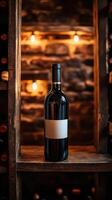 Wine bottle standing in an old cellar with blank label illuminated by warm lights photo