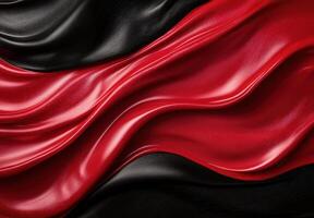 Abstract background of flowing red and black fabric photo