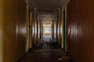 Corridor of old abandoned building photo