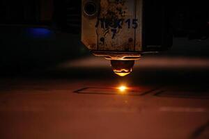 Working laser cutting machine, close up view photo