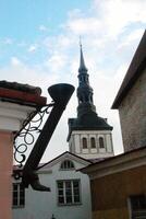Boot, Long Leg Street, Old Town, Tallinn, Estonia. Symbol of Long Boot street Pikk Jalg. Gutter in the shape of a Long Boot on The Long Leg Street or Pikk Jalg, historical district of Europe city photo