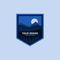A badge with a mountain and trees in the background vector