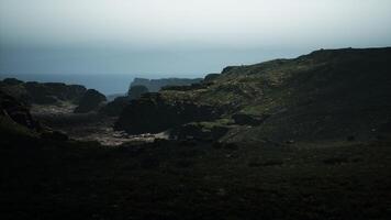 A view of the ocean from the top of a hill. mountain path video