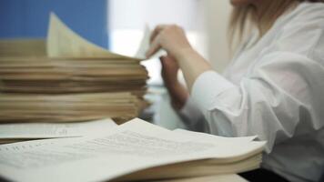 Office Worker Sorting Paper Documents video