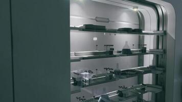 Modern storage unit displaying scientific equipment in a laboratory setting video