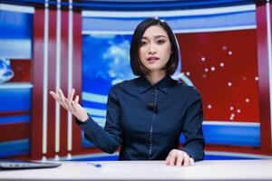 News anchor creating reportage on live broadcast program, discussing latest breaking news for international tv network. Asian reporter journalist covering all important events, television channel. photo