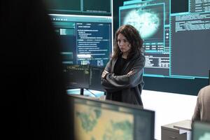 Cyber security expert in a national safety operations center detecting cyber attacks or threats. Governmental hacking team focusing on data protection, cyber operations in progress. photo
