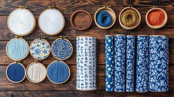 A variety of different types of fabric and embroidery supplies photo