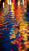 Reflection of lights on water at night photo