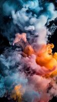 Colorful smoke in the air on a black background photo