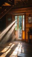 Sunlight streaming through a wooden door in a cabin photo