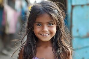 A young girl smiles for the camera photo