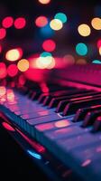 A piano keyboard with lights in the background photo