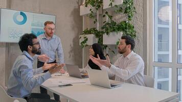 Emotional business team arguing at office discussing financial strategy graphics results diverse multiracial businessmen businesswoman dispute at corporate briefing solve issuess disagreement conflict photo