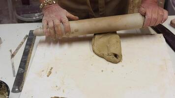 Working on Clay in Ceramic Workshop video