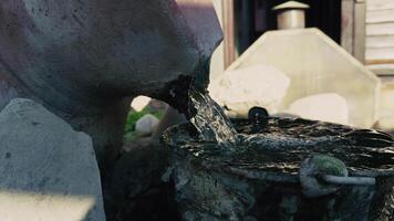 Flowing Water to a Bucket Fountain Pool video