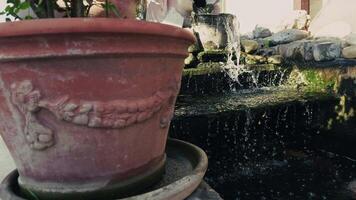 Flowing Water On to Stone Steps Fountain Pool video