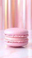 single pink macaron with smooth texture and pastel color photo