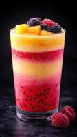 Freshly blended smoothie with vibrant layers of fruit flavors and textures photo