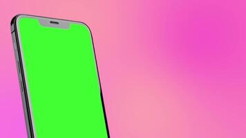 Animated of a smartphone with a green screen, ideal for editing or using chroma key in videos on a pink background