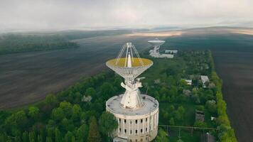 Flight near the astronomical radio telescope. Space exploration using a radio telescope. video