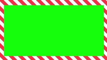 Green screen background with blue and white warning stripesA green screen background with a red and white striped warning border, ideal for overlays, editing, and chroma key effects. video