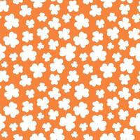 St Patricks Day pattern with shamrocks. Seamless orange background and white clover leaves. Saint Patricks March 17 holiday backdrop. flat illustration. vector